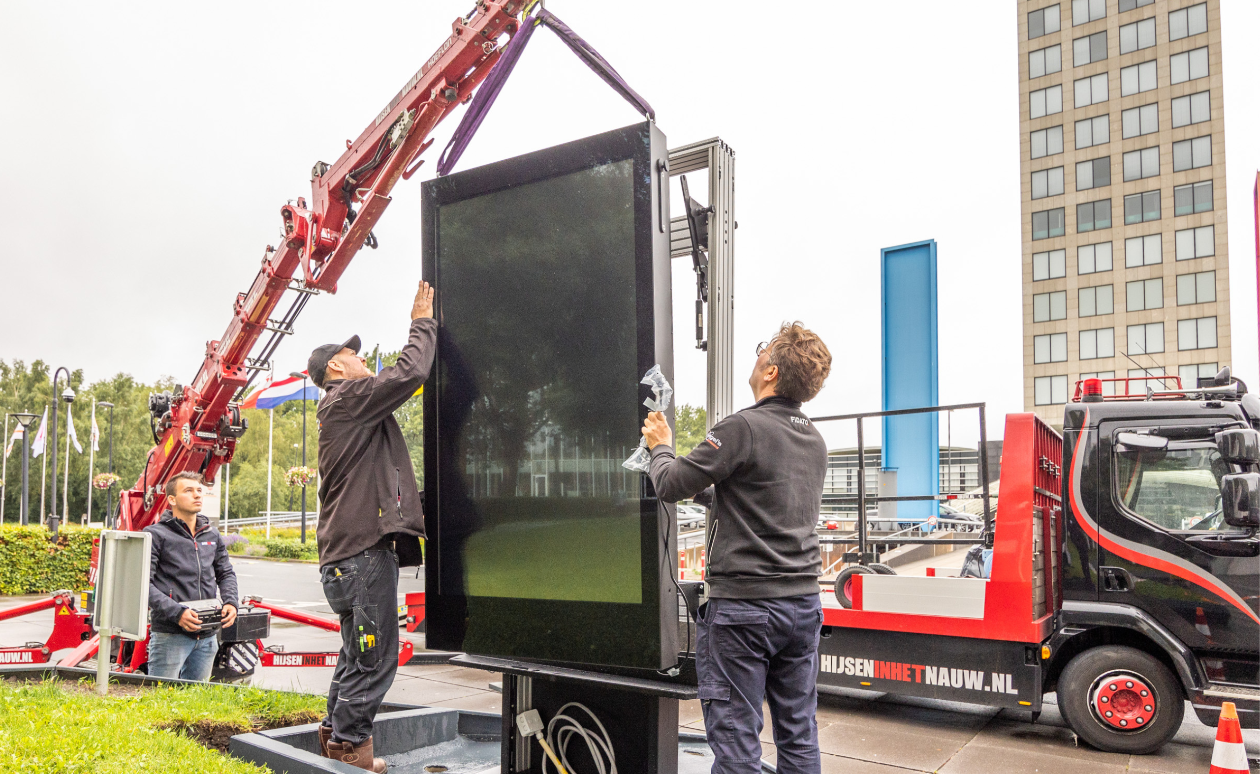 a.s.r. verzekeringsmaatschappij met buitenschermen op de parkeerplekken van Fidato